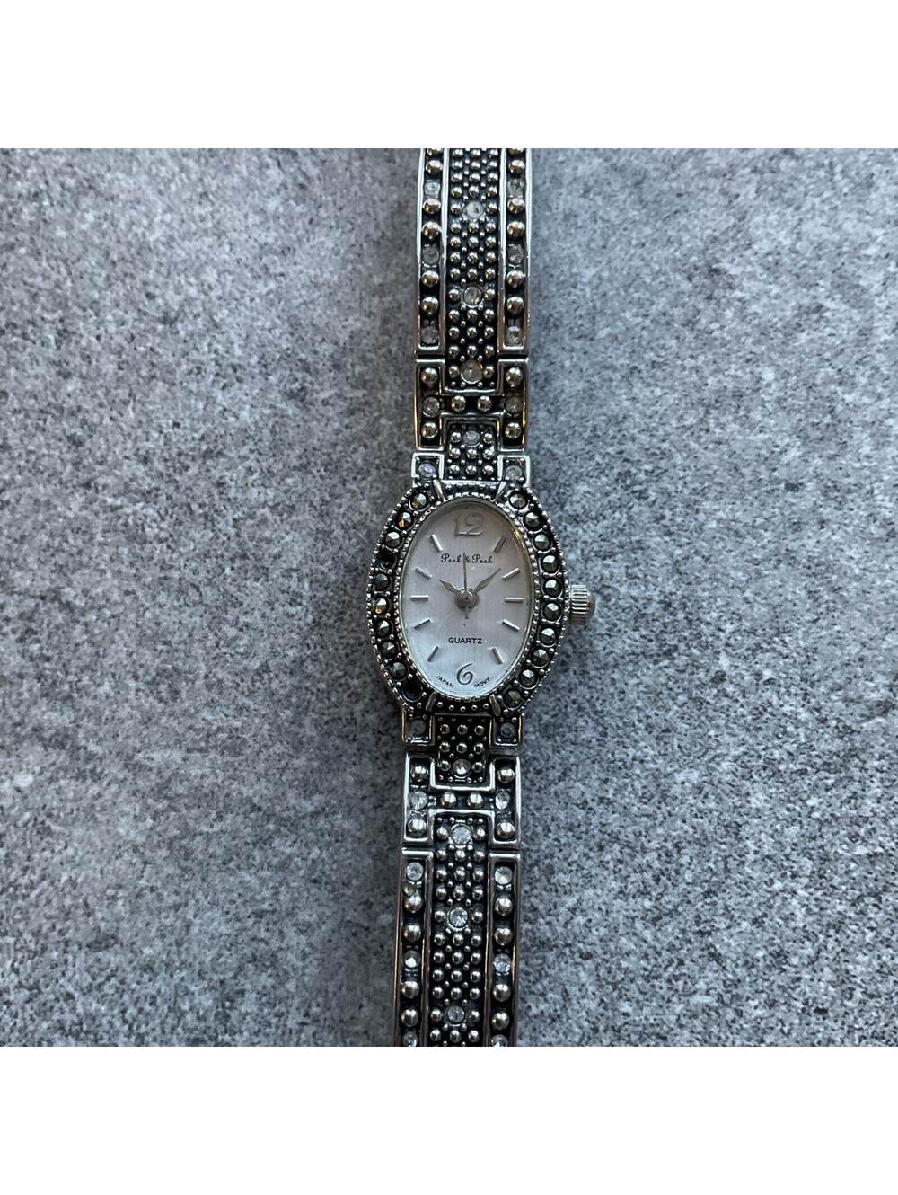 Women's Peck & Peck Oval White Dial Silvertone Rhinestone Quartz Watch B-W